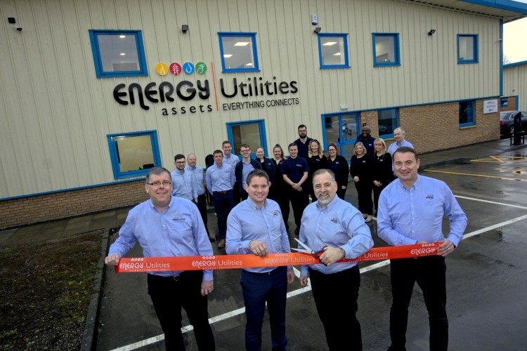  The ribbon-cutting at the new Stirling base was carried out by managing director Steven Lynch accompanied by operations director Brian Ward (second from left) and members of the EAU team.