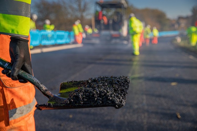 Graphene-enhanced asphalt being laid in Curbridge