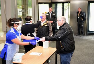 Face masks handed out on arrival