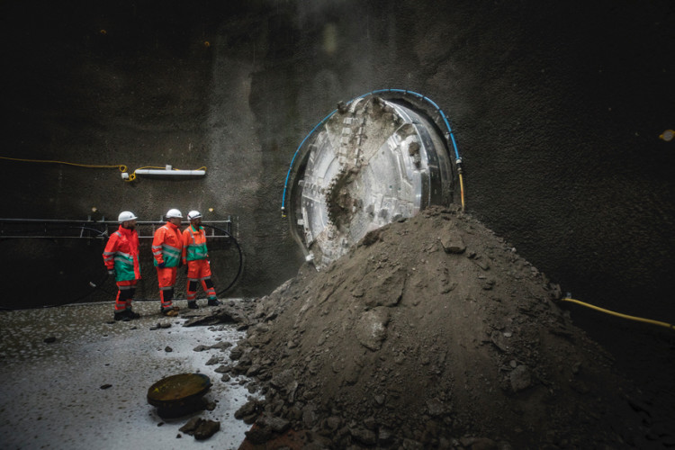 Pre-coronavirus image of a Tideway tunnel boring machine breaking through