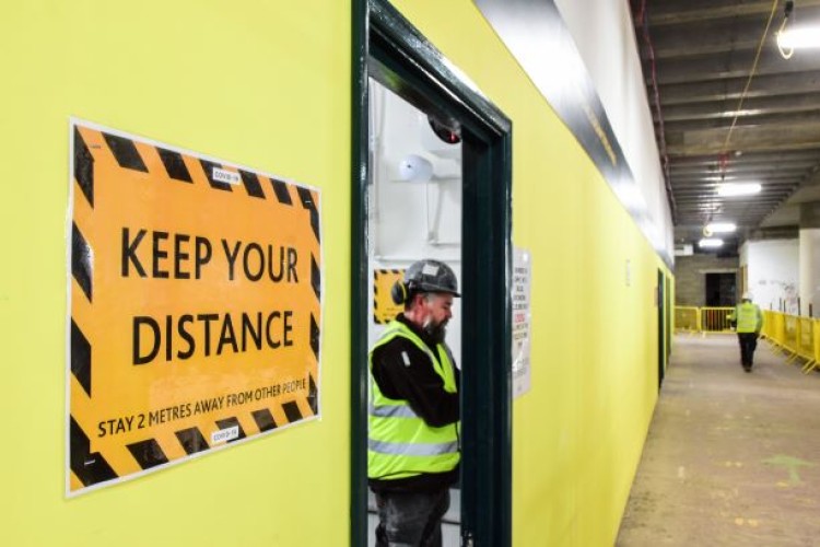 Social distancing requirements are impacting on site productivity. This photo is from a Willmott Dixon office refurb job at 85 Gresham Street, London EC2