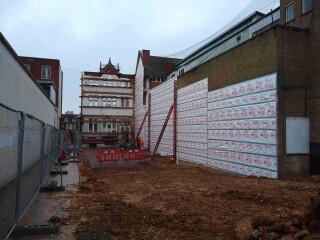 The back of the building is being demolished and rebuilt