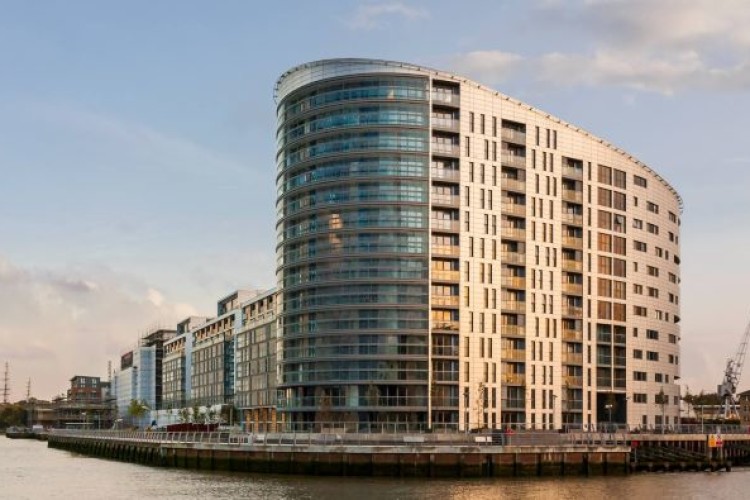 Re-cladding work has stopped at New Capital Quay 