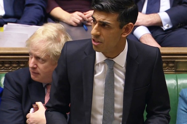 Chancellor Rishi Sunak at the despatch box in the Commons, delivering his first budget