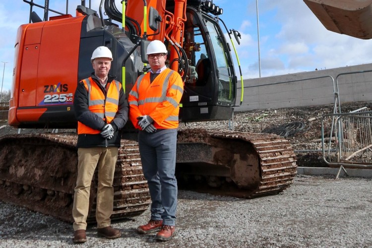 David Roberts, CEO of Hitachi Construction Machinery UK, (left) with Dave Bennett, managing director of Topcon Positioning GB