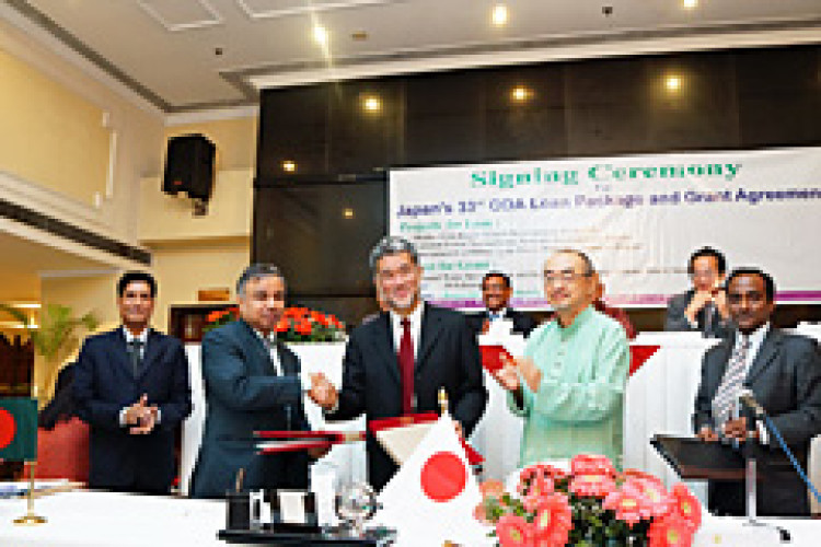 Japanese and Bangladesh officials have signed a loan agreement.