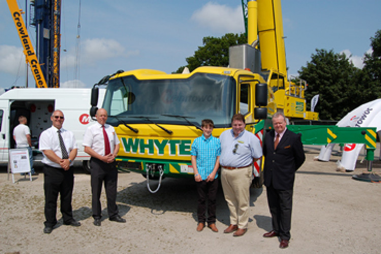 Kim Dandridge and Barry Fry from Manitowoc with Lawrence Whyte Junior and Lawrence Whyte of Whyte Cranes, and Steve Barnett, Manitowoc