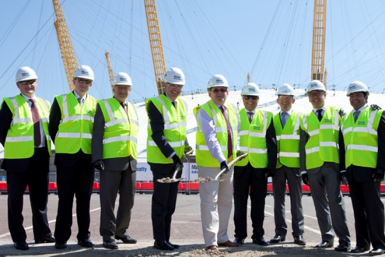 Balfour Beatty&rsquo;s Mike Peasland (centre) didn&rsquo;t get the memo about compulsory grey trousers for the groundbreaking photocall