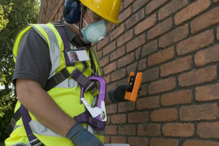 Carillion carrying out cavity wall insulation