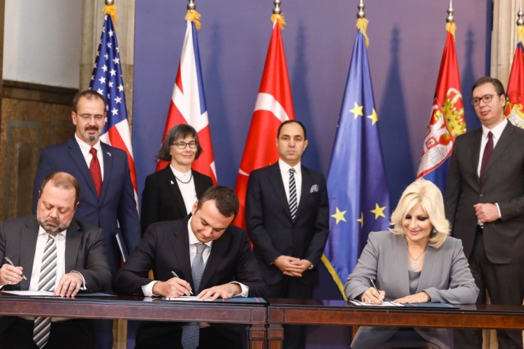 caption: The signing was carried out by Michael Wilkinson (Bechtel), Mehmet Tara (Enka) and Serbia&rsquo;s deputy prime minister Zorana Mihajlovic