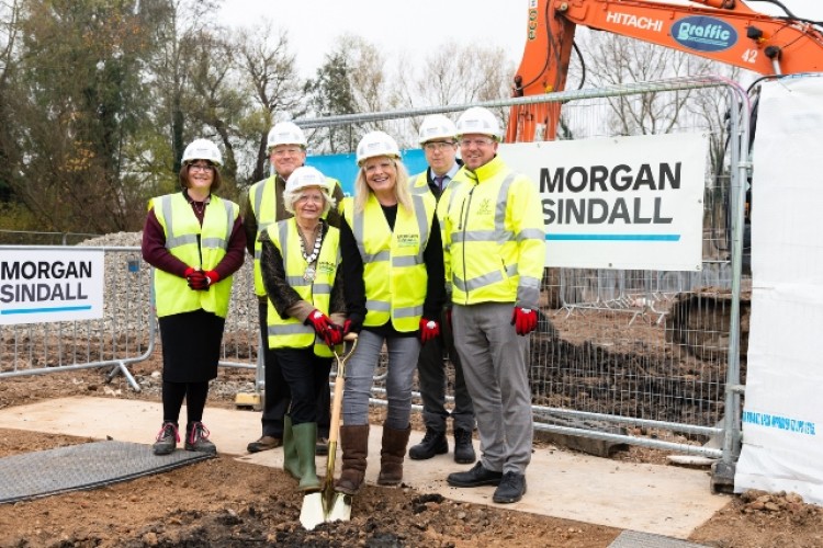 Mark McElwee of Morgan Sindall (second from the right) joins local councillors for a photo shoot on site