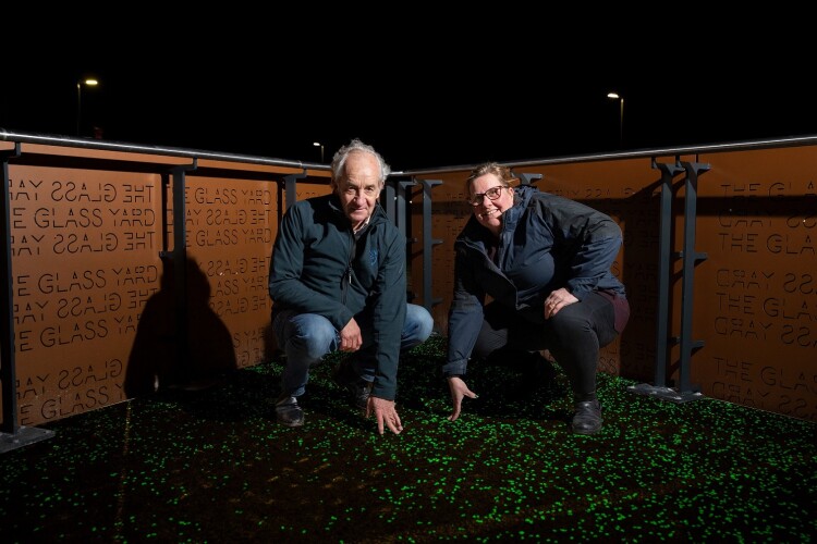 Tim Turner, MD of developers Blue Deer Ltd, with Tarmac rep  Sarah Newstead, on a glow-in-the-dark walkway at The Glass Yard in Chesterfield