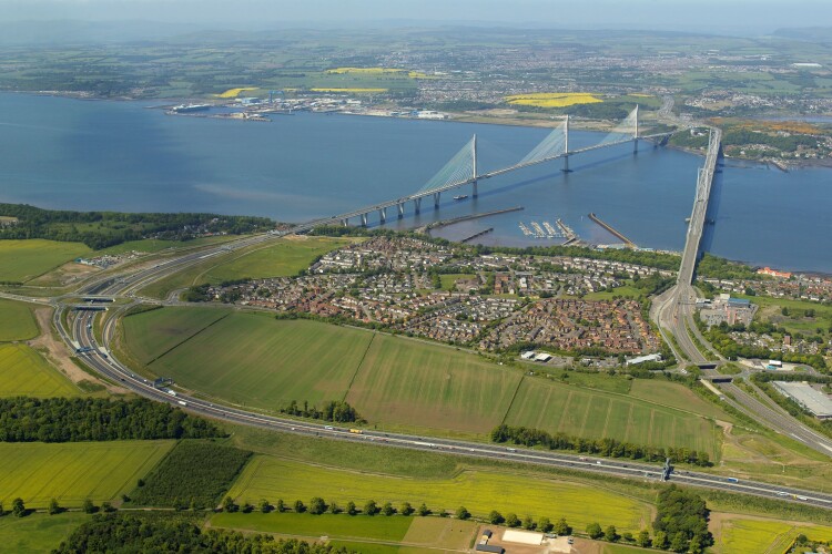 The site lies between the approaches to the Queensferry Crossing and Forth Road Bridge
