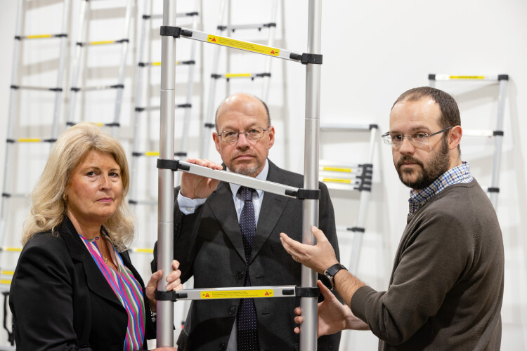 Left to right with a dodgy ladder are Ladder Association chair Gail Hounslea, Cambridgeshire County Council senior trading standards officer Andrew Fayers and John Darby, manager of the Test & Research Centre