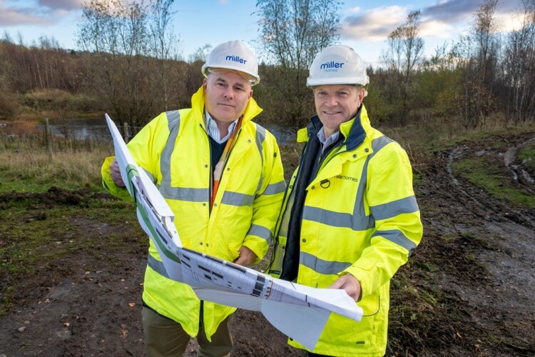 Miller Homes Scotland West regional land director Arthur Mann (left) and regional operations director Andrew McArthur (right) at Hawthorn Green in Bellshill [© Peter Devlin]
