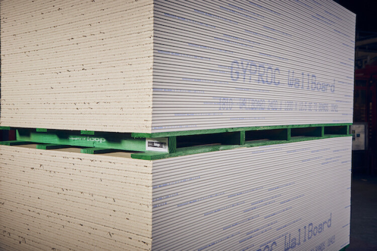 Plasterboard transported on a reusable green pallet. If you see one, claim money back instead of dumping it