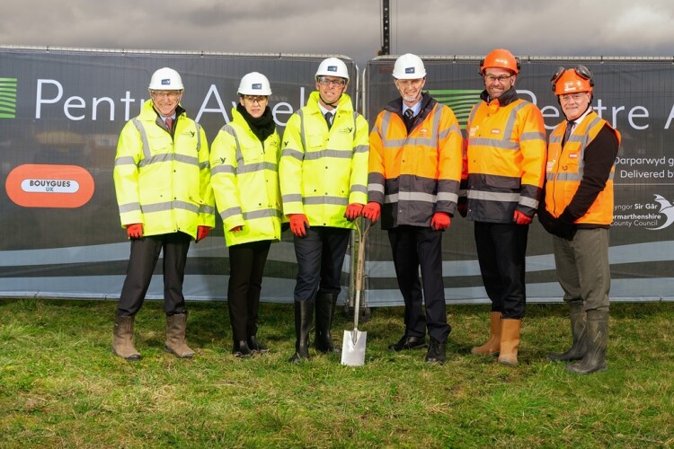 Carmarthenshire councillor Gareth John, council chief executive Wendy Walters, Cllr Darren Price, Welsh secretary David Davies, Bouygues regional MD John Boughton and Bouygues project director Peter Sharpe
