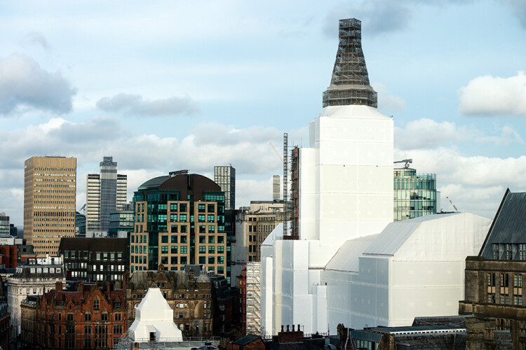 Lyndon SGB has encapsulated Manchester Town Hall inside shrink-wrap sheeting