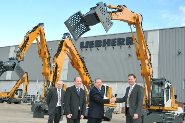 Left to right: Liebherr GB area sales manager Ian Lawes, Bywaters MRF operations director Nick Glover, Bywaters md John Glover, Liebherr GB md Peter Mayr
