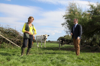 Environment minister Rebecca Row (left) discusses nitrate pollution on a visit to a farm in Warblington