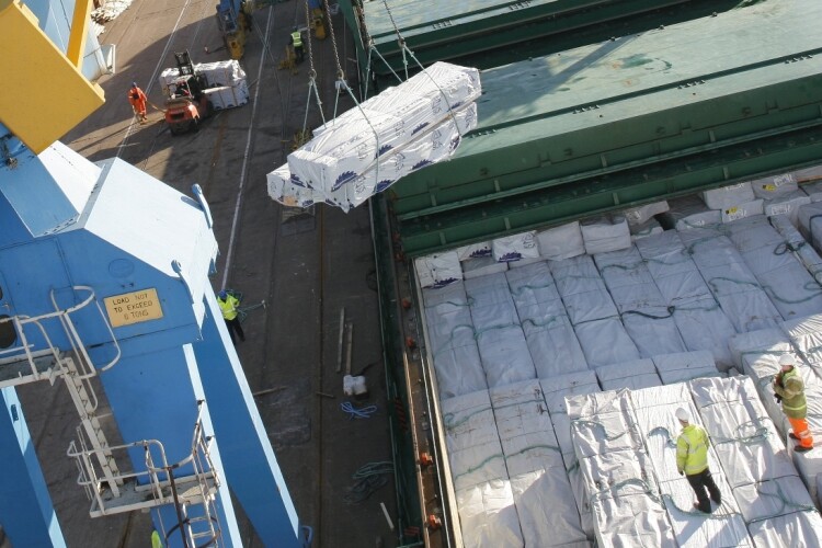 Imported timber being unloaded at a UK dock (Image courtesy of SCA Wood UK)