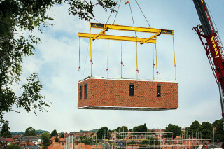 This house was installed on site in Arnold, Nottinghamshire in July 2002 – the first of 131 prefabricated affordable homes for Jigsaw Homes Group – but it was made 80 miles away by Ilke Homes in a factory in Knaresborough, North Yorkshire