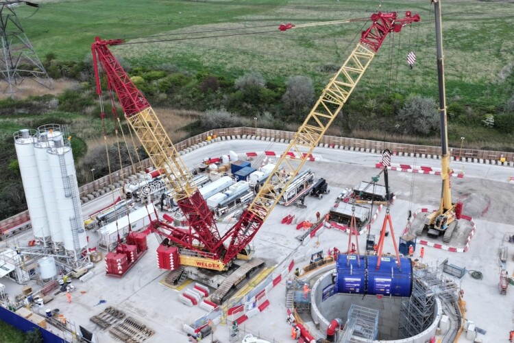 A Weldex crawler crane lowers the TBM