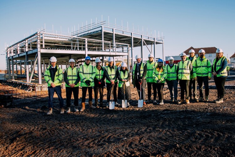 The sod cutting ceremony took place after the steelwork had gone up