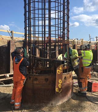The rebar cages for the deep piles were made in four sections and welded together in situ
