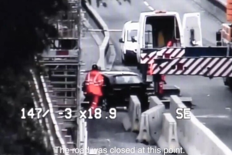 A motorist caught on CCTV encroaching onto road works