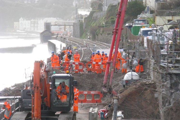 Repair of collapsed rail track at Dawlish after storms destroyed 100m of sea wall in early February