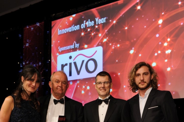 Paul Cummings, director of BlueSky Solutions (second from left), receives the 'innovation of the year' prize from the IOSH Awards delegation.