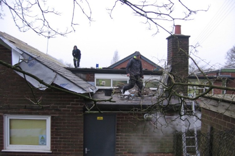 Workers on the school roof in Clayton le Woods