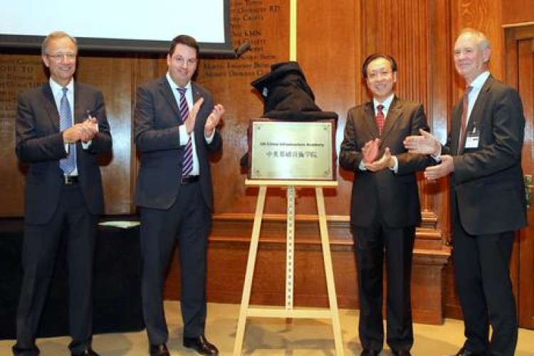 Andrew Percy MP, Lin Nianxiu, Alan Penn and Tony Meggs unveil a plaque marking the launch of the UK-China Infrastructure Academy