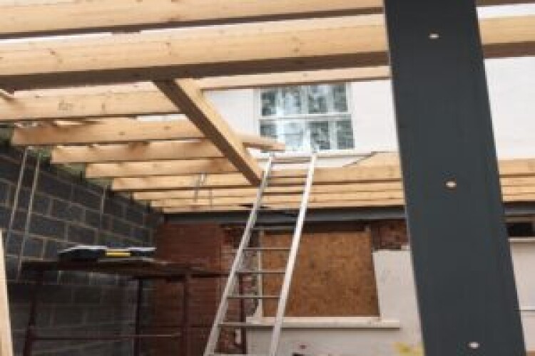 A joist failed during construction of the extension