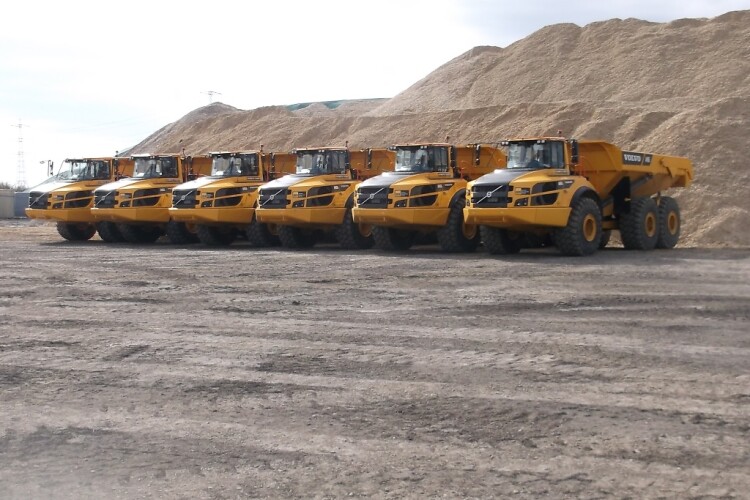 Some of Stevens' new articulated dump trucks