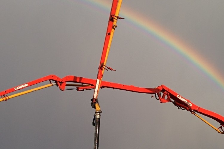 A break in the weather allows the team to complete deck pour two on the feeder line box