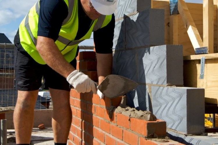 Laying bricks and blocks made by Forterra