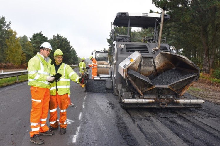 Hanson contracts manager Ian Price, left, on the A338 Bournemouth spur road upgrade project 