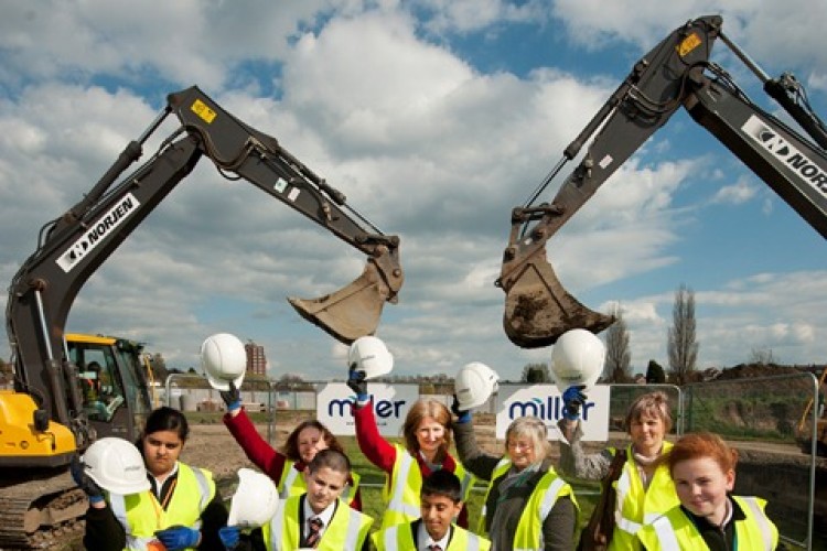 Pupils celebrate the start of construction