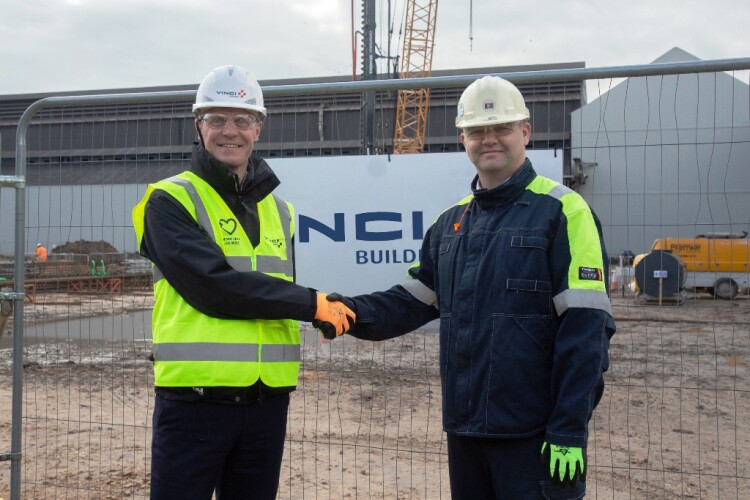 Vinci Building regional director Chris Winspear (left) shakes on the deal with Sheffield Forgemasters chief operating officer Gareth Barker