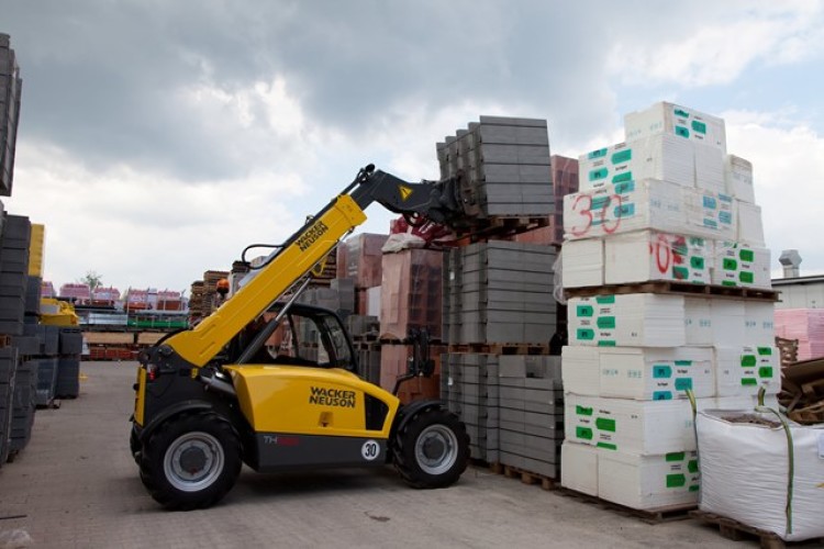 The Wacker Neuson TH522 telehandler in action. The smaller TH408 is shown below.