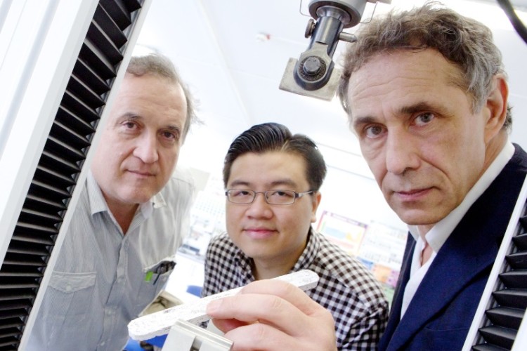 The team behind shreddie board: Dr Anton Ianakiev, Hooi Cheah and Dr Anthony Crabbe, with a stick of their new material