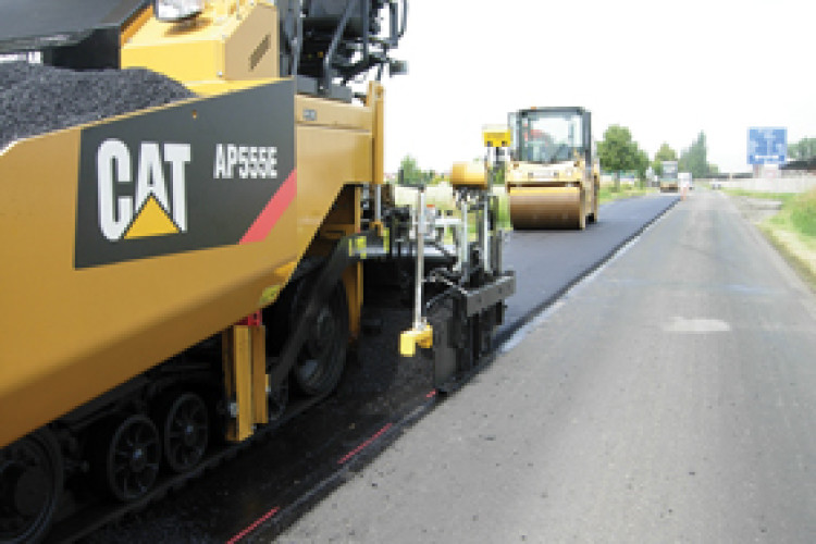 Cat compaction control uses in-cab electronics to tell the operator when an area is fully compacted