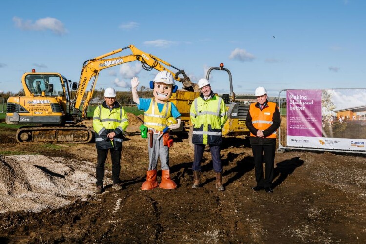 Left to right are site manager David Gana, health & safety mascot Charlie Conlon, chairman Michael Conlon and Blackpool councillor Cllr Mark Smith. [Photo @Jebsoncreates]
