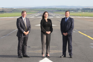 Astraius chief executive Kevin Seymour (left), Glasgow Prestwick commercial director Zoe Kilpatrick and South Ayrshire Council leader Peter Henderson (right)