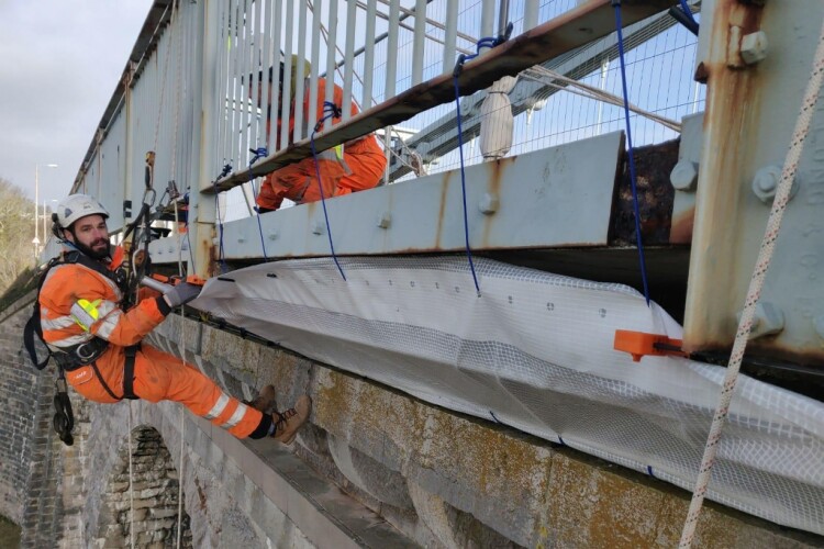 A Spencer crew working on the Menai Bridge