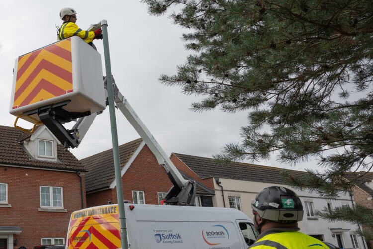 Installing the first lanterns on Bergamot Close in the village of Red Lodge, near Newmarket, on Friday 10th September