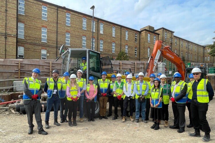 The team lines up for ground breaking