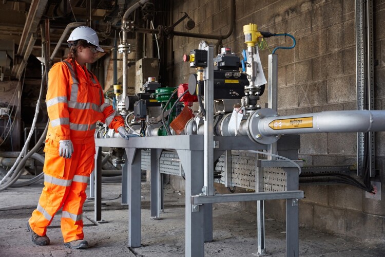Hanson UK graduate trainee manager Miriam Joyce monitors the fuel switching trials at Ribblesdale, Lancashire